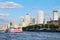 Ferry on the river Thames in London with a view of Canary Wharf