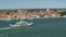 Ferry sailing down Venice canal, water transportation, view of architecture