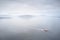 Ferry ship crossing on open vast ocean cruise journey aerial view from above during atmospheric weather sea island trip Scotland U
