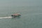 Ferry and supply boat near Sihanoukville Autonomous Port, Cambodia