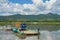 Ferry transports a timber truck across the Selenga river in the village of Ilyinka, Republic of Buryatia