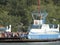 Ferryboat makes the crossing of cars through the Bertioga channel