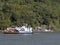 Ferryboat makes the crossing of cars through the Bertioga channel