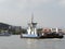 Ferryboat makes the crossing of cars through the Bertioga channel