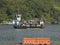 Ferryboat makes the crossing of cars through the Bertioga channel, between the cities of Guaruja and Bertioga