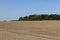 Fertile plowed soil in an agricultural field