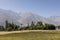 Fertile Wakhan Valley near Vrang in Tajikistan. The mountains in the background are the Hindu Kush in Afghanistan