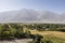 Fertile Wakhan Valley near Vrang in Tajikistan. The mountains in the background are the Hindu Kush in Afghanistan