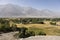 Fertile Wakhan Valley near Vrang in Tajikistan. The mountains in the background are the Hindu Kush in Afghanistan