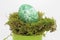 Fertility symbol, easter egg marbled with algae powder, fully organic