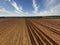 Fertilizing land where sugar cane was planted aerial view