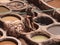 FES, MOROCCO - MAY 31, 2013: Photo of Leather processing in vats in leather tanning and dyeing Shuar.