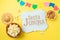 Festa Junina party background with popcorn, peanuts and wooden board. Brazilian summer harvest festival concept. Top view, flat