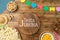 Festa Junina party background with wooden board and traditional food. Brazilian summer harvest festival concept. Top view, flat
