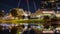 The festival centre and the adelaide cityscape reflecting in the river torrens at night in South Australia on January 25th 2021