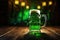 Festival drink beer. A mug of foamy green beer on a wooden table. Traditional hop flavor. St. Patrick\\\'s Day