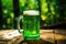 Festival drink. A mug of foamy green beer on a wooden table. Traditional hop flavor. St. Patrick\\\'s Day celebration concept,