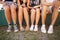 Festival footwear. Cropped image of a group of young peoples feet at a music festival.