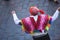 festival of the sun inti raymi male with typical clothes dancing and typical hat top view with cobblestone street