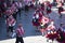 festival of the sun inti raymi with typical clothes dancing and typical hat top view with cobblestone street background -