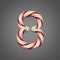 Festive alphabet number 8. Christmas font made of mint striped candy canes. 3D render on gray background.
