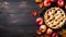 Festive American apple pie dark wooden background. Festive sweet dessert for Thanksgiving, pie day. Top view copy space