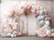 Festive arch made of pearl-colored balloons in pastel colors