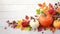 Festive autumn decor from pumpkins, berries and leaves on a white wooden background. Concept of Thanksgiving day or Halloween.