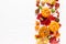 Festive autumn pumpkins decor with fall leaves, berries, nuts on white background. Thanksgiving day or halloween holiday, harvest