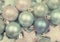 Festive background of aqua pale blue christmas ornaments