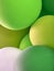 Festive background from balloons. Green balloons. Abstract background