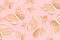 Festive background made with gold tracery illuminating butterflies and with shiny confetti on pink. Holiday concept. Top view