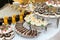 Festive banquet table with cakes and drinks