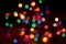 Festive blurred bokeh background, bright circles, defocused lights