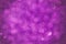 Festive blurred bokeh background trend color magenta