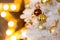Festive blurred Christmas background with white Christmas tree