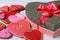 Festive box with a bow and colorful biscuit hearts for Valentine