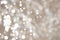 Festive brown silver bright abstract Bokeh with white circles. T
