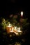 Festive candles on a dark wooden bench