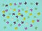 Festive children`s background for your projects, confectionery sweet sprinkles in the shape of butterflies on blue.