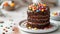 Festive chocolate pinata cake with cocoa for birthday with colorful delicious candies. Cake close up. Happy Birthday concept