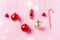 Festive Christmas Background with Decorations Red and Gold Ball Candy Cane Pink Background Drawing Snow Horizontal