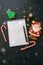 Festive Christmas background, white page of notepad with inscription \