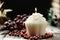 Festive Christmas candel on wooden table