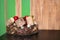 Festive Christmas composition, plate with wooden ornaments, balls and cones