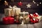 Festive Christmas Gifts And Baubles Illumninated By Lights On Rustic Wooden Table With Star Fairy Lights On Dark Background