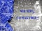 Festive Christmas holiday winter wide background with bright blue tablecloth in traditional colors covered sparkling snowflakes on