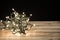 Festive Christmas Lights: Captivating Illumination on Retro Wooden Desk