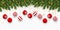 Festive Christmas or New Year Background. Christmas fir-tree branches with confetti and xmas red balls. Holiday`s Background.