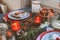 Festive Christmas and New Year table setting in red and grey tones. Dining place for celebration with handmade rustic details